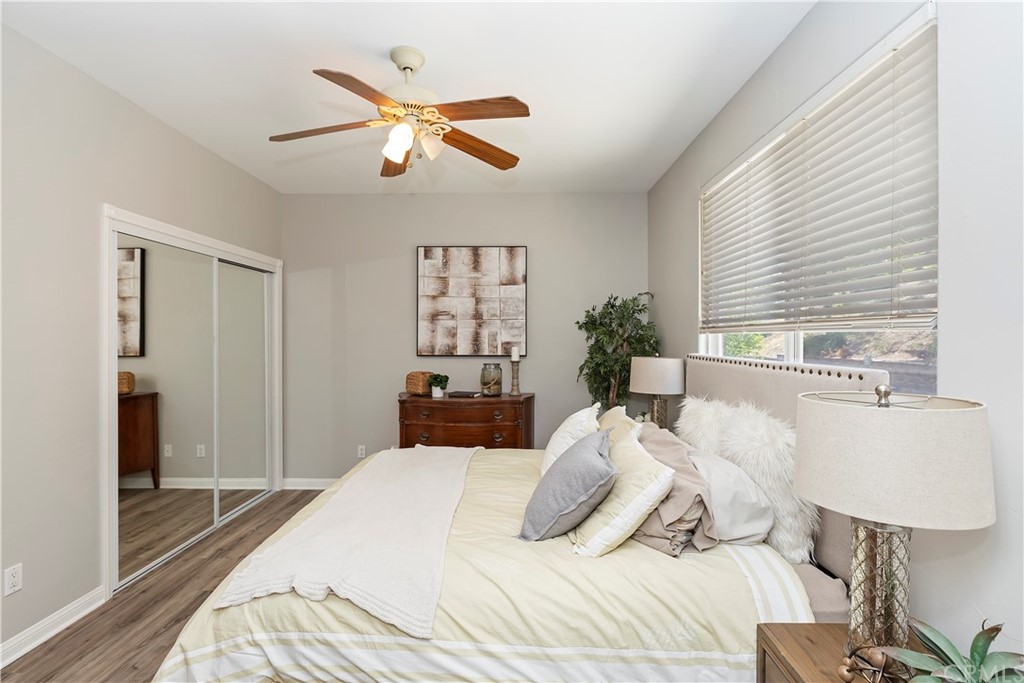 33425 Monte Verde Temecula, CA 92592 - Photo 39 of 68 a bedroom with a large bed and a window