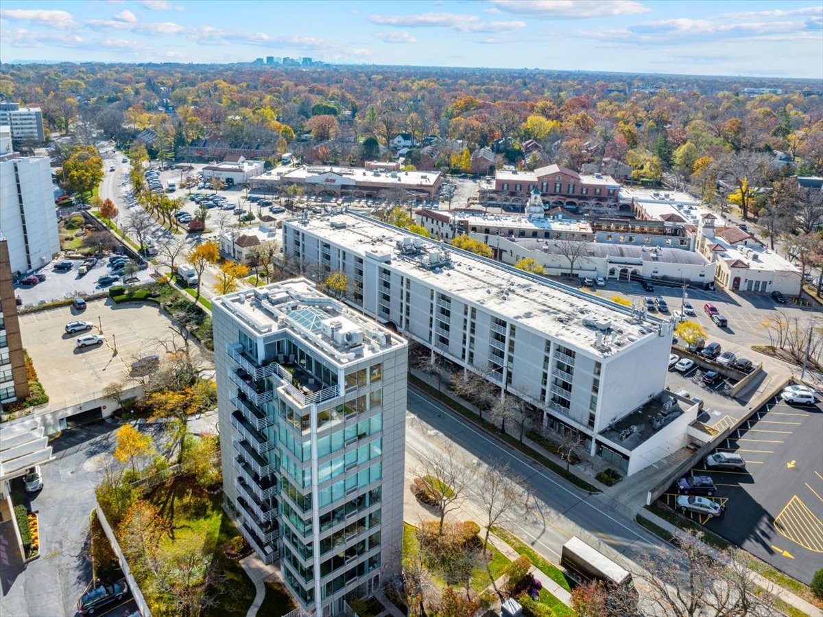 1618 Sheridan Road, Unit PH Wilmette, IL 60091 - Photo 46 of 49 a city view with tall buildings