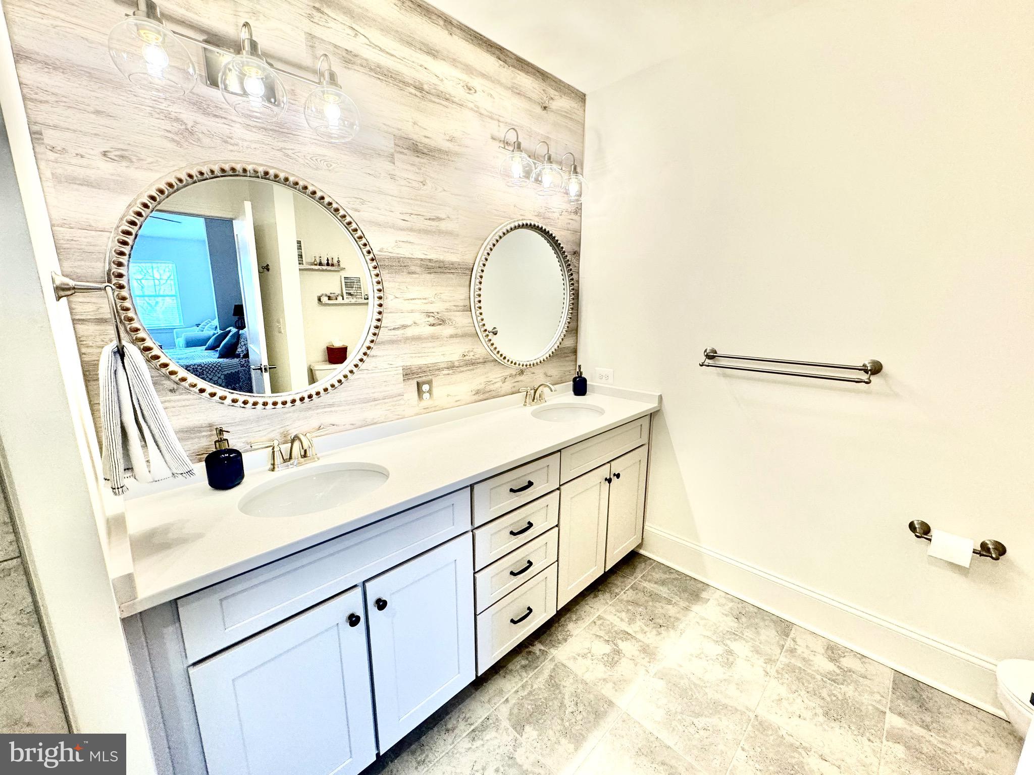 1414 Burke Road, Unit 304 Middle River, MD 21220 - Photo 11 of 22 Primary Double Sinks and Accent Wall
