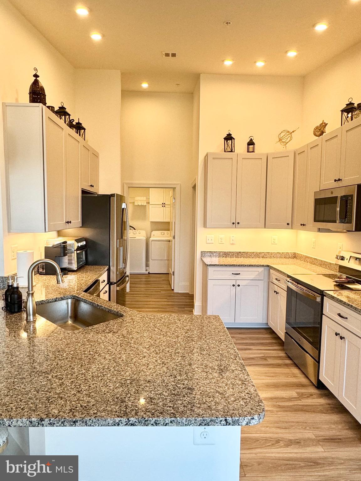Kitchen with High Ceilings and Plenty of Lights
