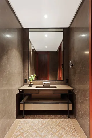 a bedroom with two beds and a couch