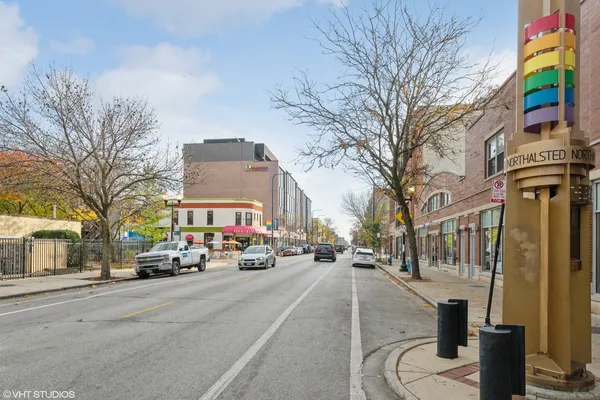 a front view of a building with street view