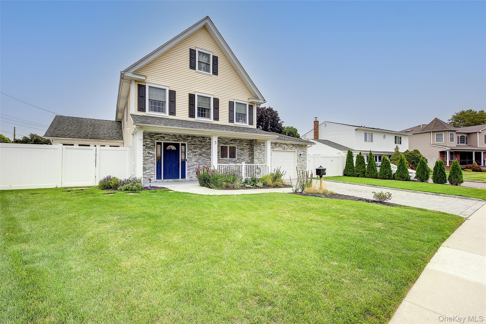 5 Candy Lane Syosset, NY 11791 - Photo 1 of 1 a view of a house with a yard and sitting area