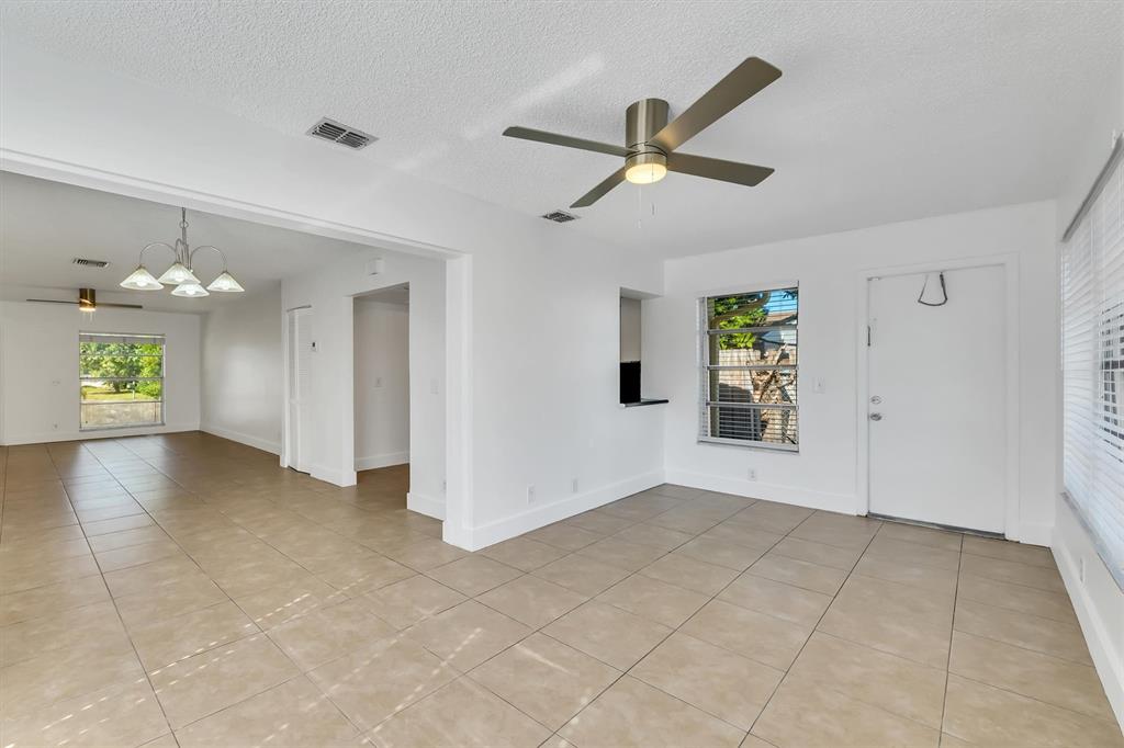 180 Southwest 78th Avenue Margate, FL 33068 - Photo 22 of 40 a view of an empty room with a window