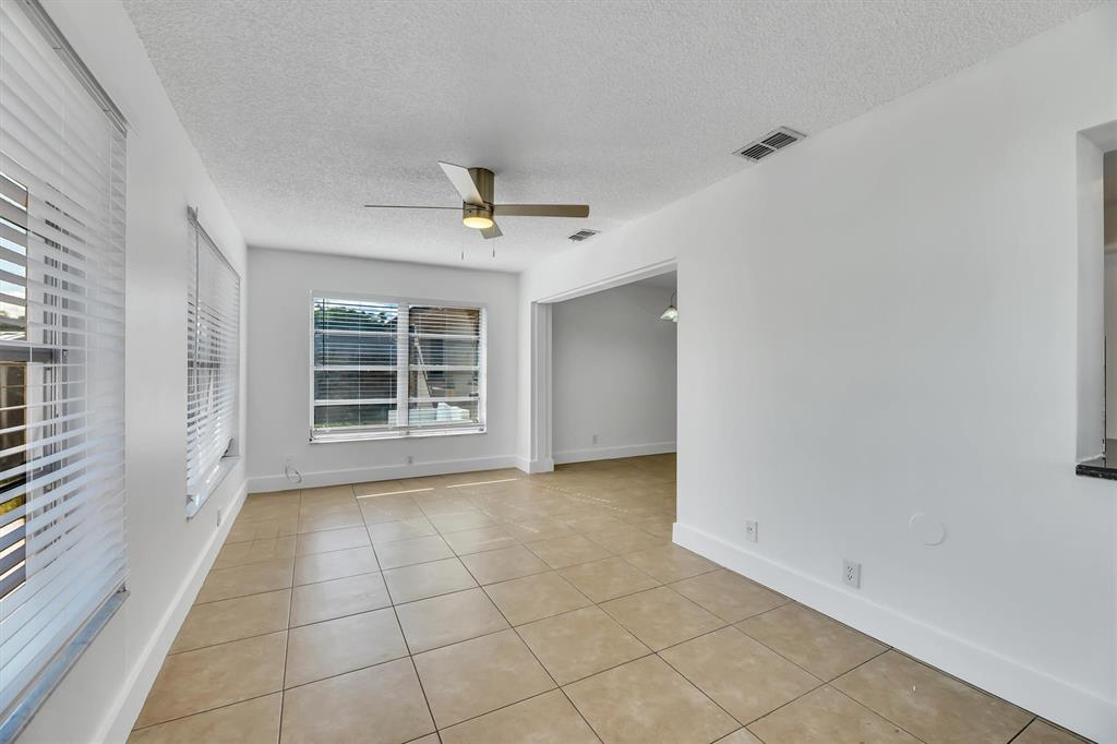 180 Southwest 78th Avenue Margate, FL 33068 - Photo 23 of 40 a view of an empty room with a window