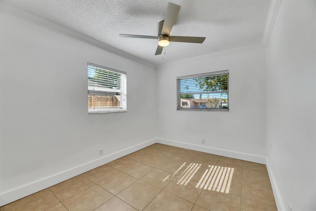 180 Southwest 78th Avenue Margate, FL 33068 - Photo 31 of 40 a view of an empty room with a window