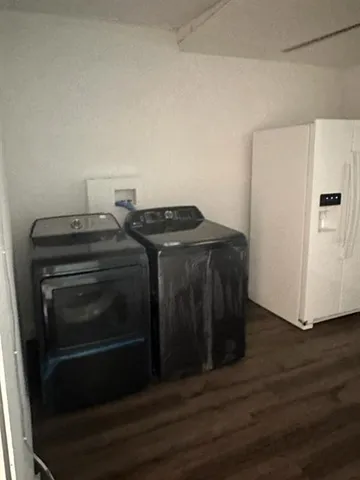 a utility room with washer and dryer