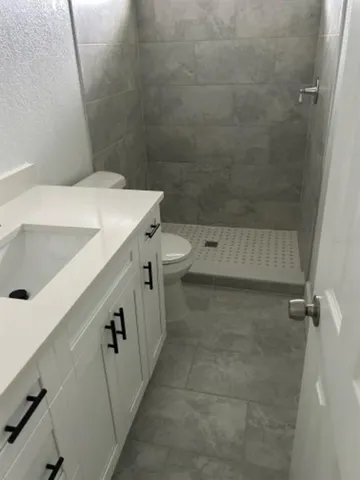 a bathroom with a sink and a toilet