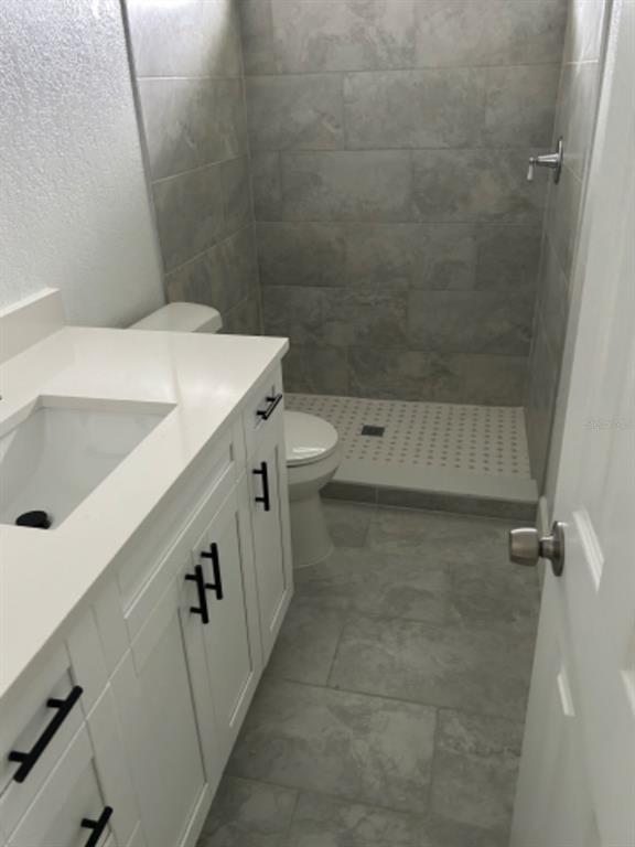 39638 Sunvalley Drive Zephyrhills, FL 33542 - Photo 9 of 14 a bathroom with a sink and a toilet