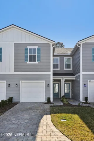 a view of a house with swimming pool
