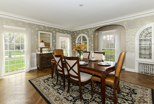 227 Raleigh Road Kenilworth, IL 60043 - Photo 13 of 40 a view of a dining room with furniture and wooden floor