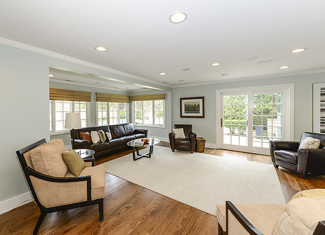227 Raleigh Road Kenilworth, IL 60043 - Photo 21 of 40 a living room with furniture and a flat screen tv with wooden floor