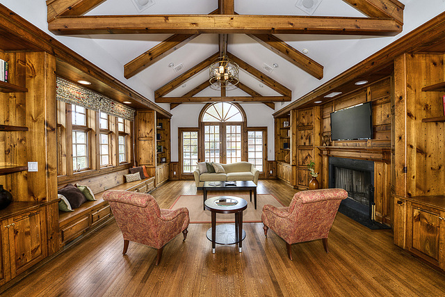 227 Raleigh Road Kenilworth, IL 60043 - Photo 23 of 40 a living room with fireplace furniture and a large window