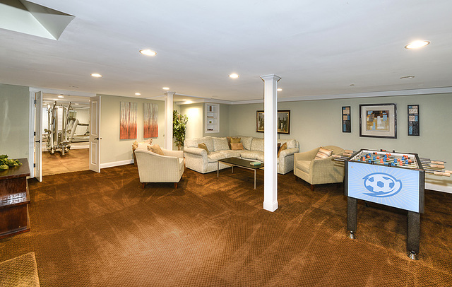 227 Raleigh Road Kenilworth, IL 60043 - Photo 32 of 40 a living room with furniture and a table