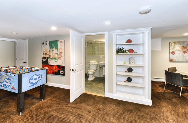 227 Raleigh Road Kenilworth, IL 60043 - Photo 33 of 40 a room with furniture and a wooden floor