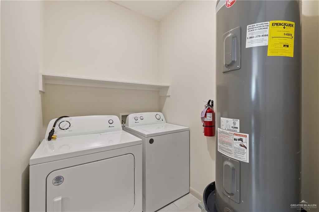 1804 West Violet Drive, Unit 1 Pharr, TX 78577 - Photo 14 of 15 a utility room with dryer and washer