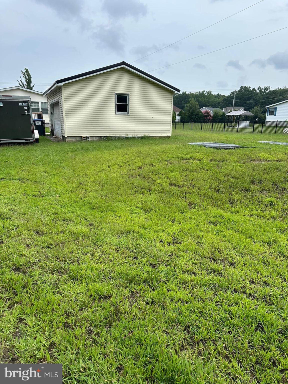 3992 Midstate Road Felton, DE 19943 - Photo 20 of 21 a big house with lots of green space