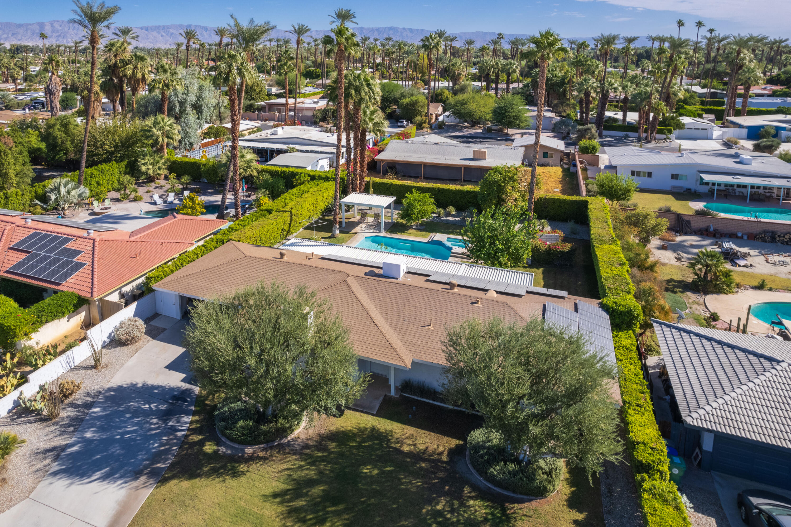 37116 Palmdale Road Rancho Mirage, CA 92270 - Photo 34 of 41 a view of multiple houses with outdoor space