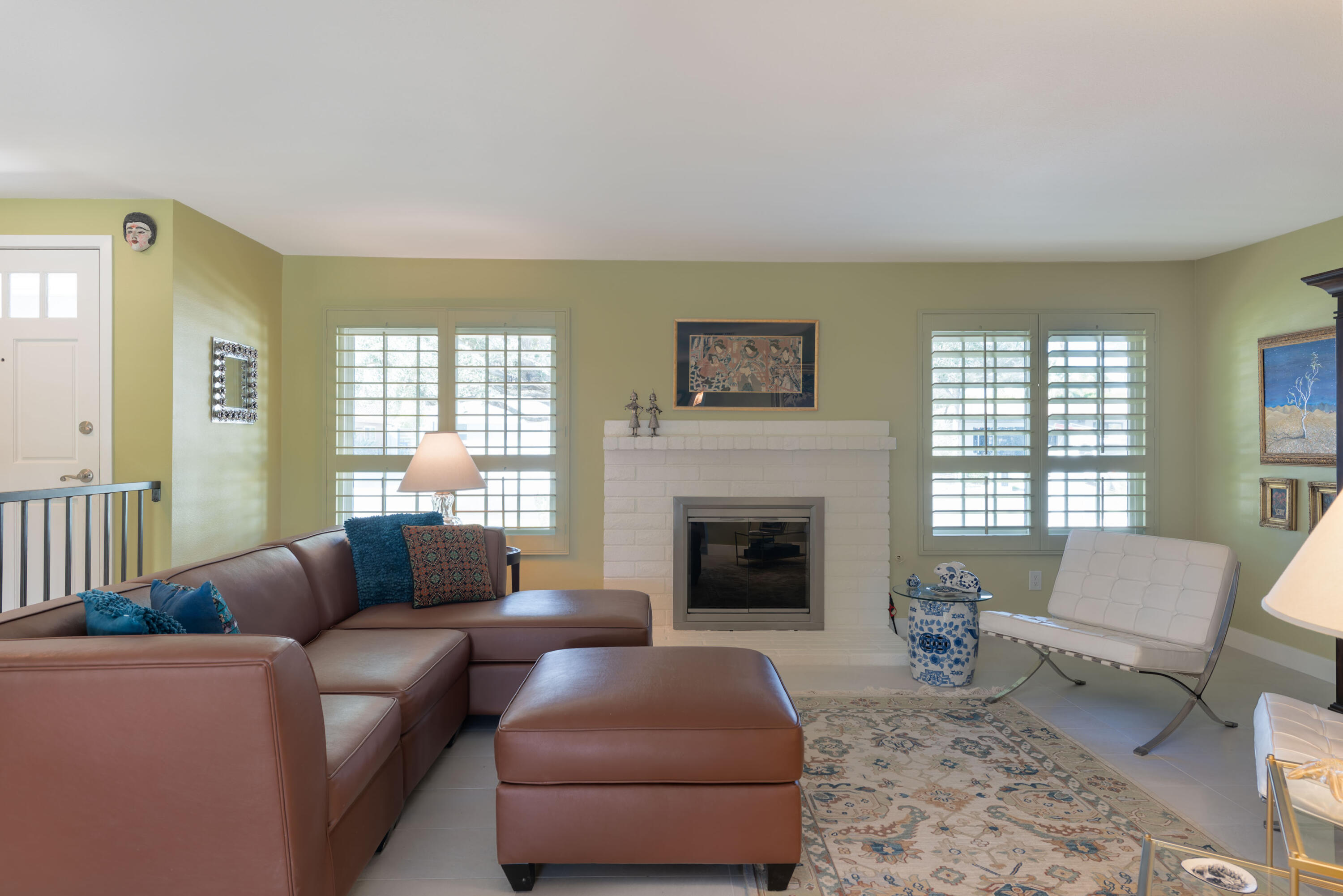 37116 Palmdale Road Rancho Mirage, CA 92270 - Photo 7 of 41 a living room with furniture and a fireplace