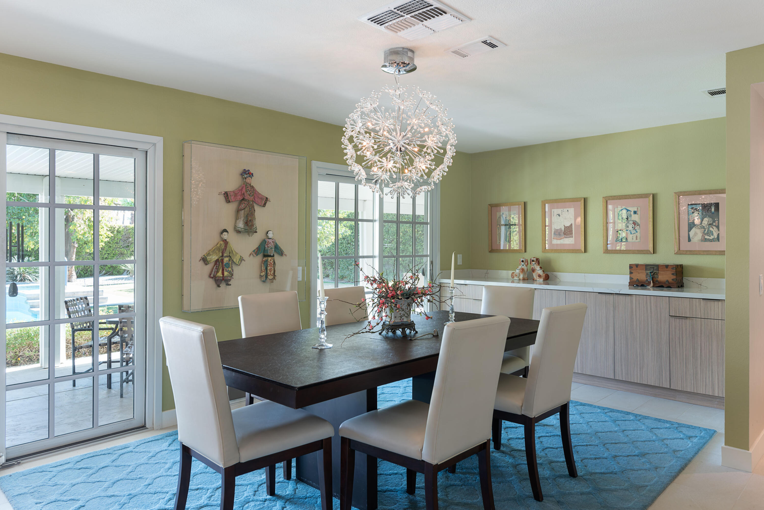 37116 Palmdale Road Rancho Mirage, CA 92270 - Photo 9 of 41 a view of a dining room with furniture wooden floor and chandelier