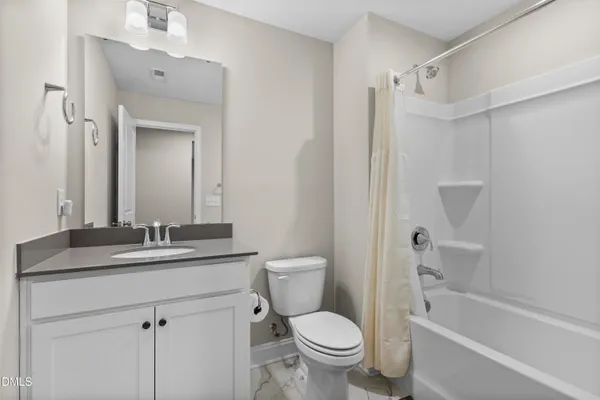 a kitchen with kitchen island a sink stainless steel appliances and cabinets