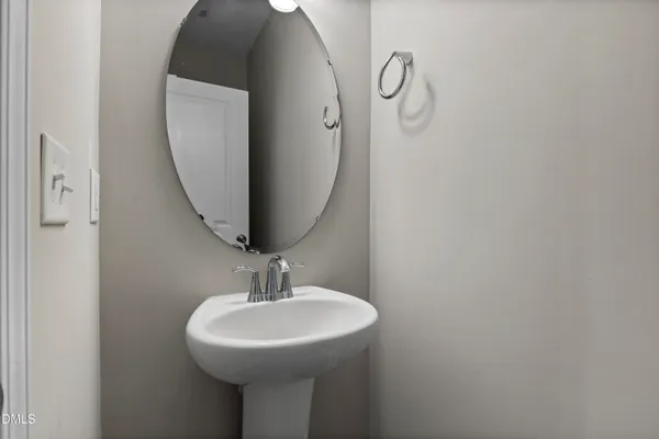 a view of an empty room and a window