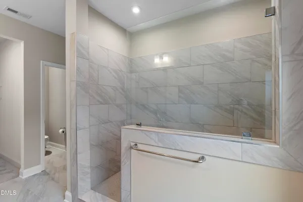 a view of a balcony with a tree