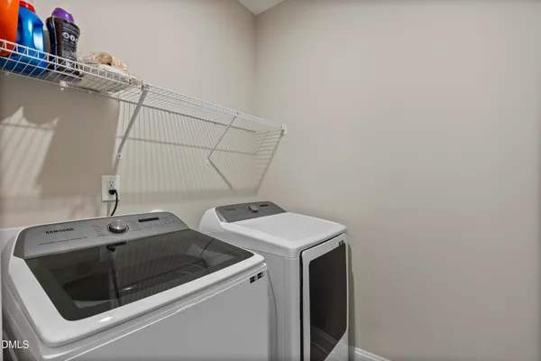 a picture of a bathroom with a picture of a wall