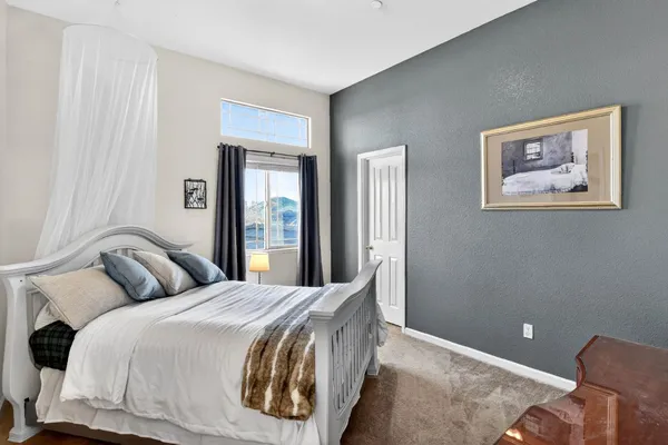 a view of a house with backyard sitting area and garden