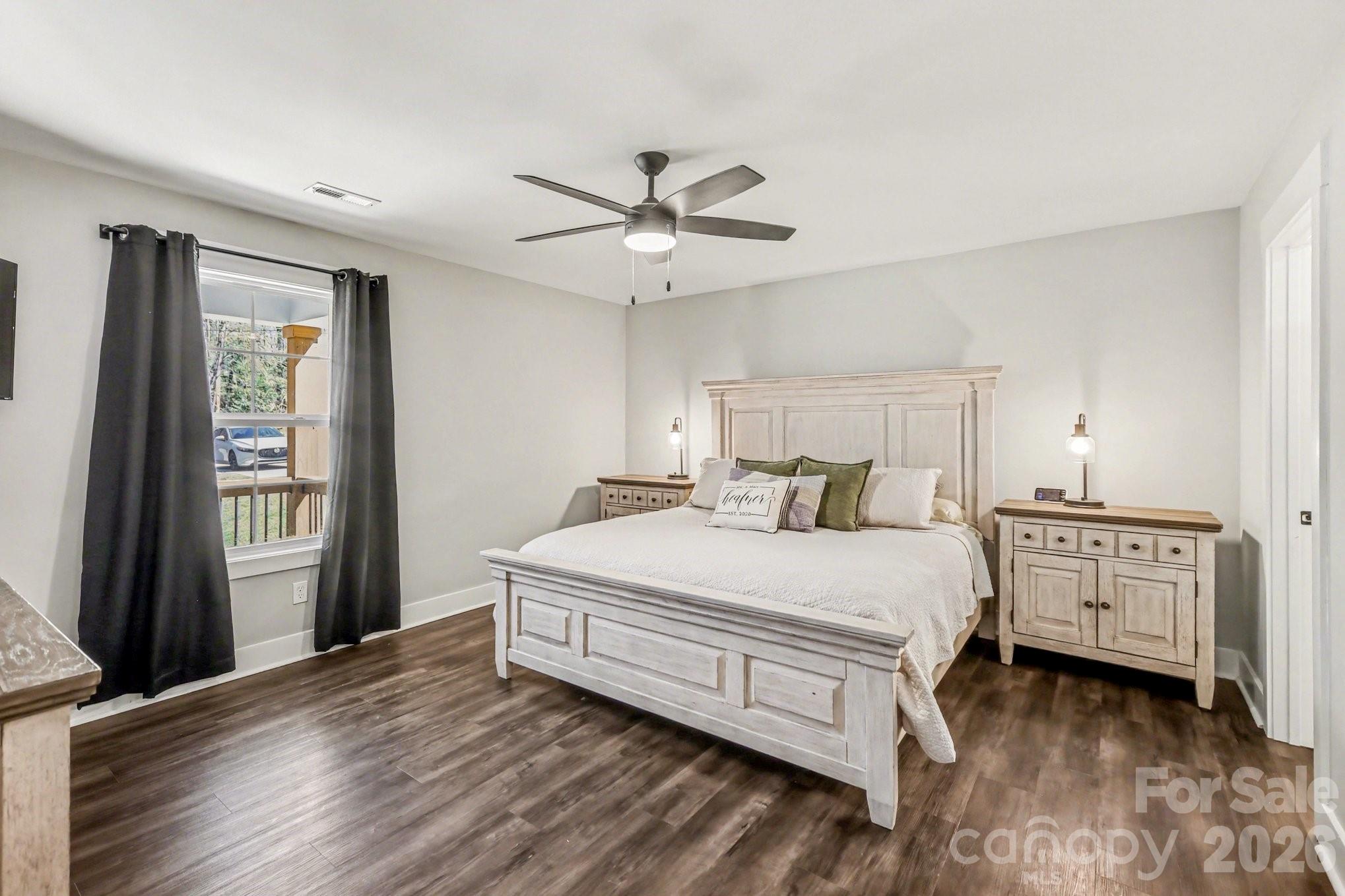 310 Old Hardin Road Dallas, NC 28034 - Photo 21 of 37 a bed room with a bed and a window