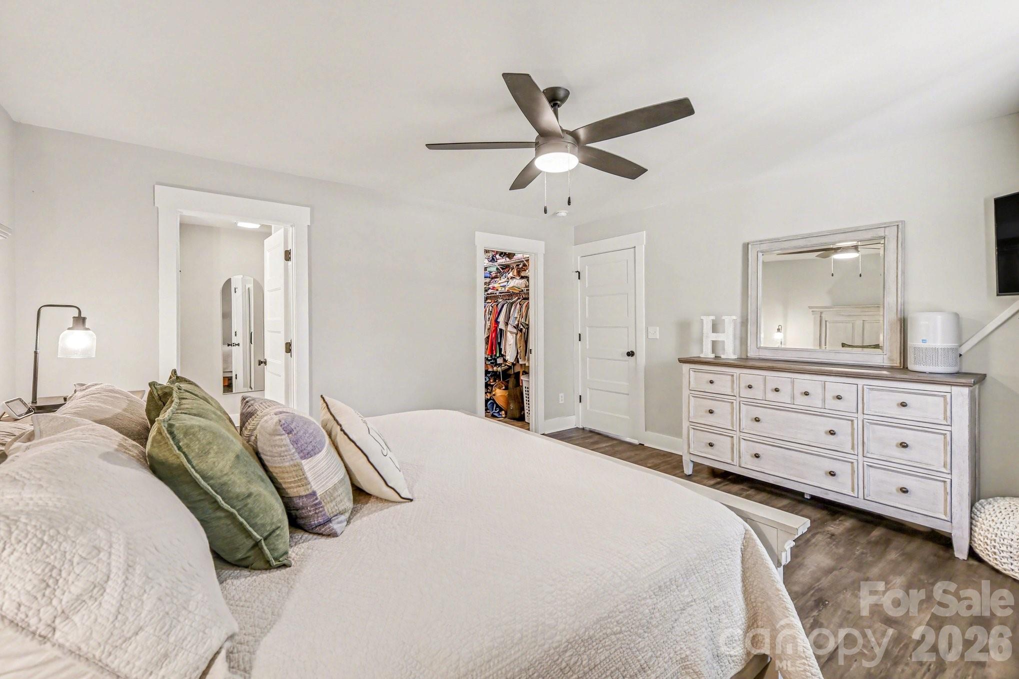 310 Old Hardin Road Dallas, NC 28034 - Photo 23 of 37 a bedroom with a bed and a mirror on dresser