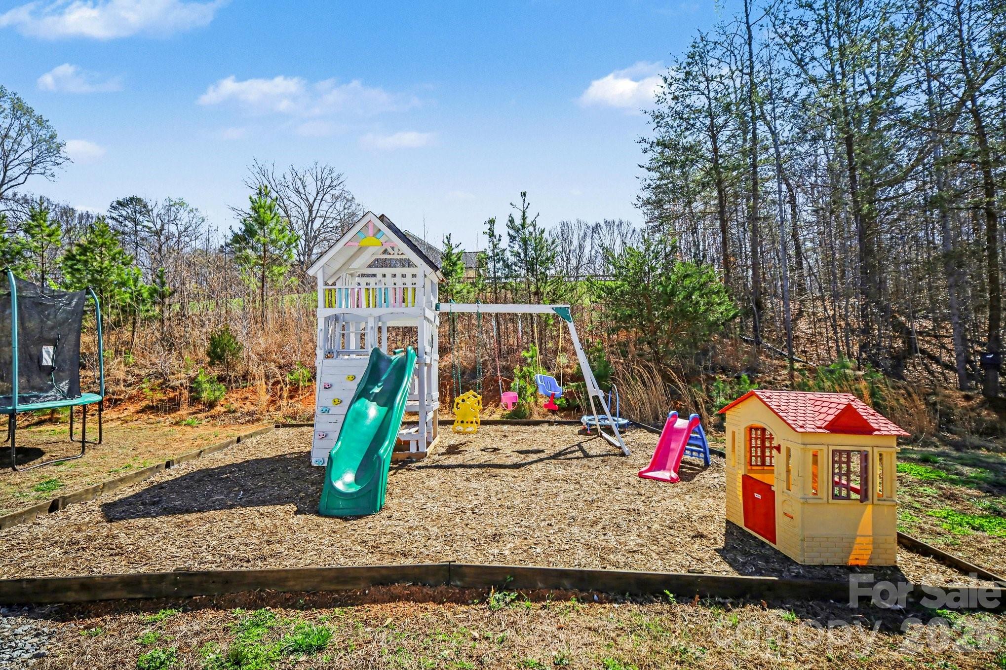 310 Old Hardin Road Dallas, NC 28034 - Photo 37 of 37 a front view of a house with garage