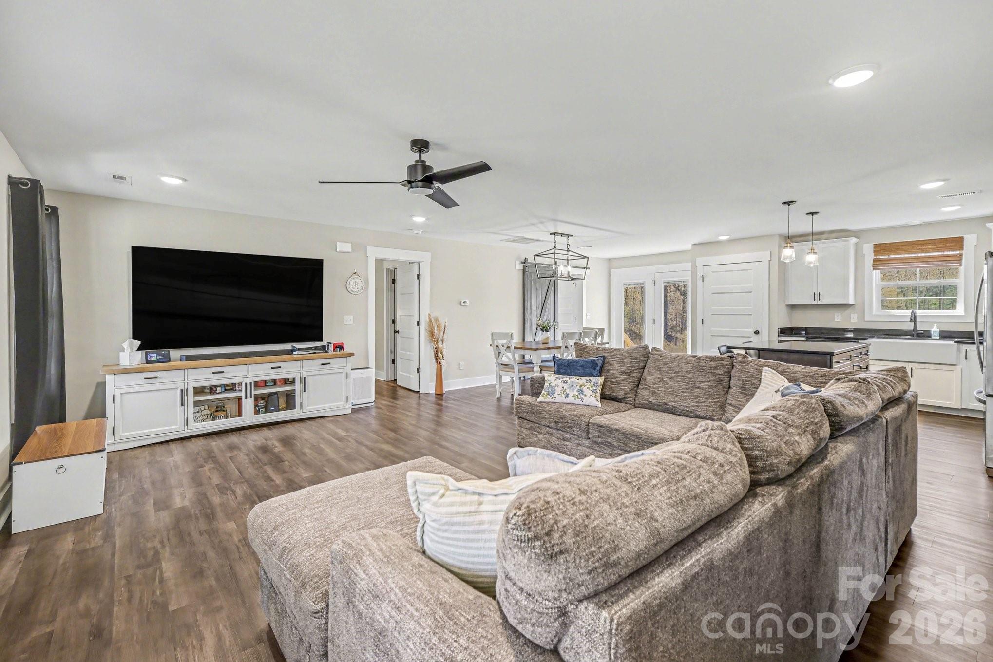 310 Old Hardin Road Dallas, NC 28034 - Photo 5 of 37 a living room with furniture and a flat screen tv