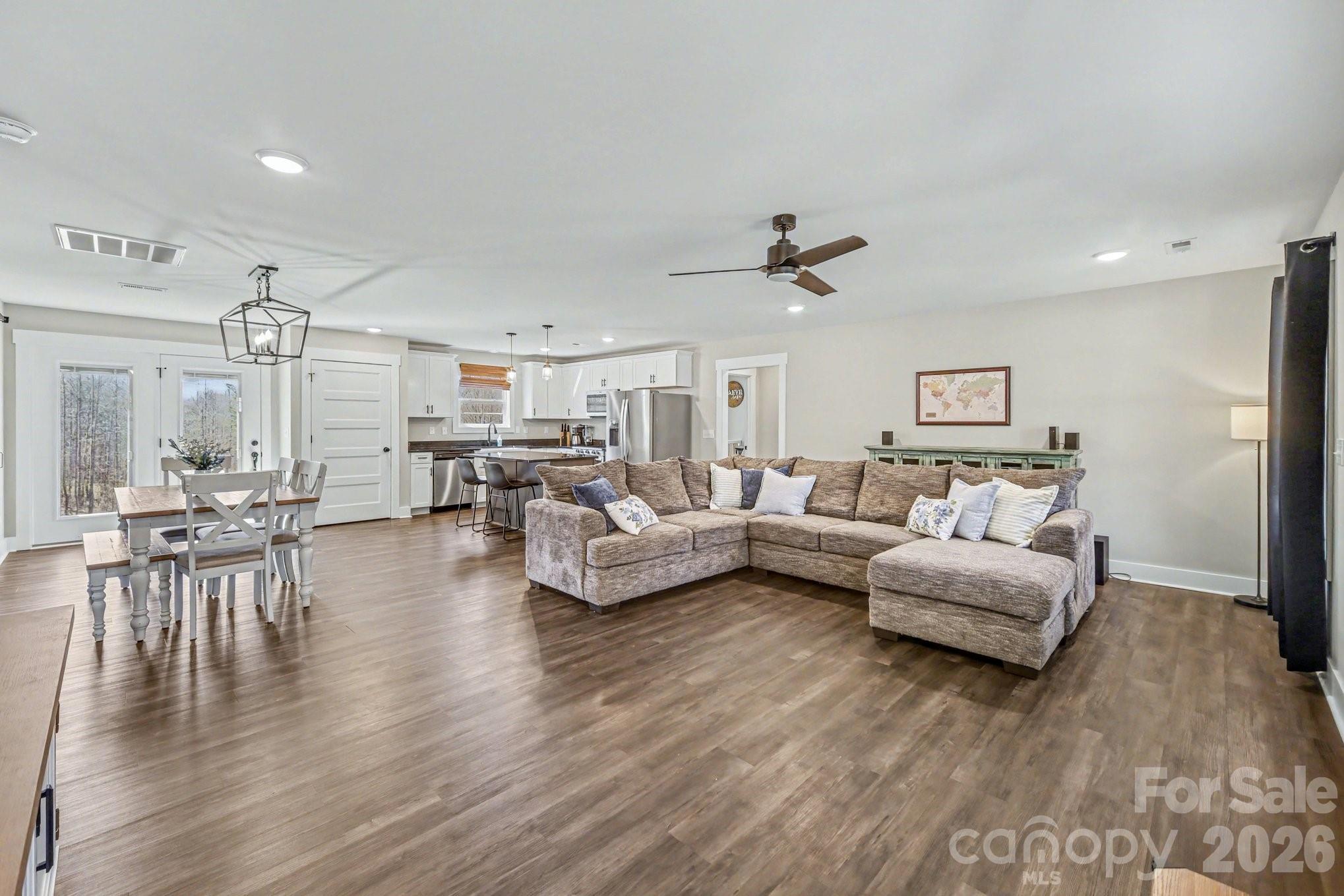 310 Old Hardin Road Dallas, NC 28034 - Photo 6 of 37 a living room with furniture and a wooden floor