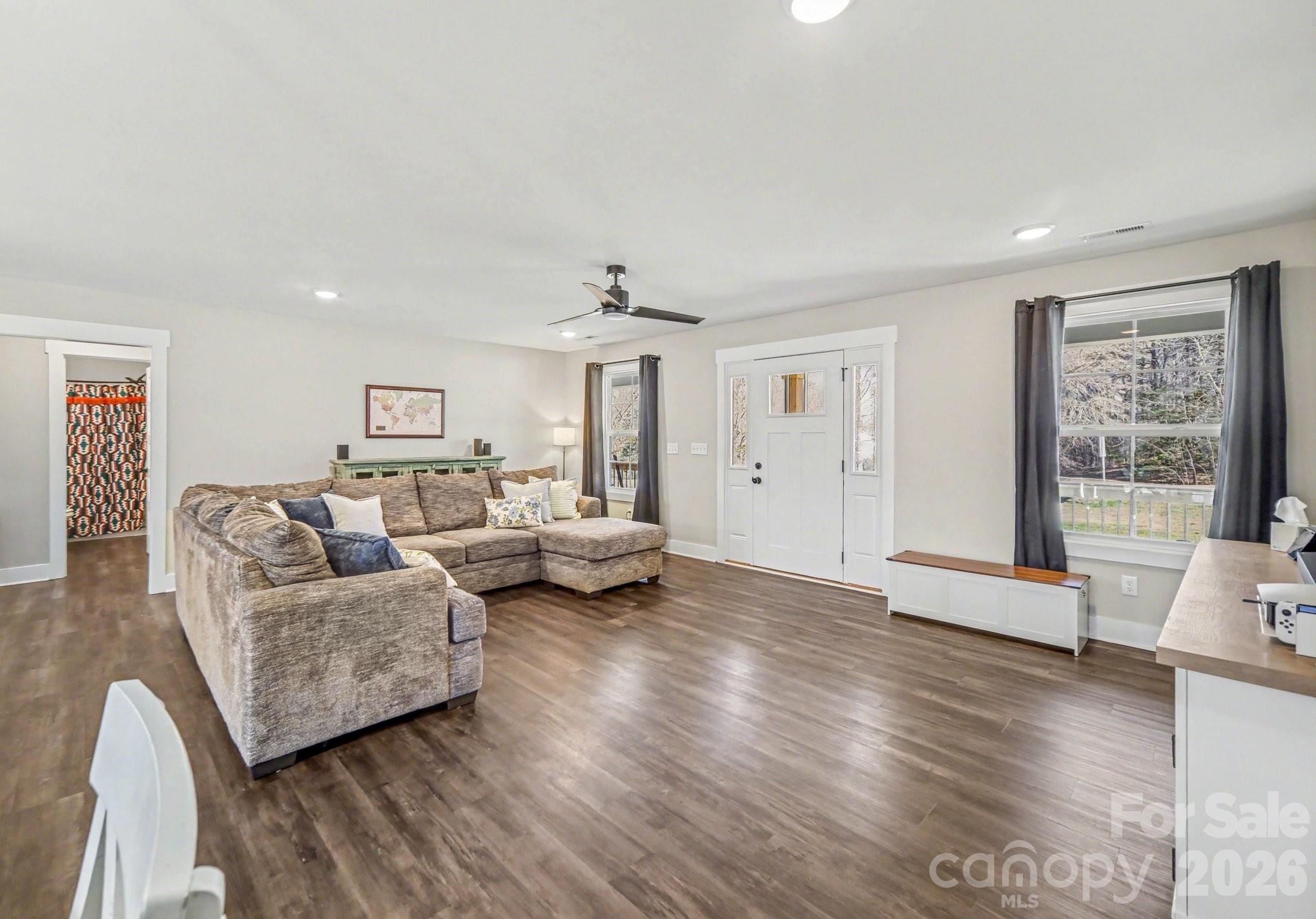 310 Old Hardin Road Dallas, NC 28034 - Photo 7 of 37 a living room with furniture and wooden floor