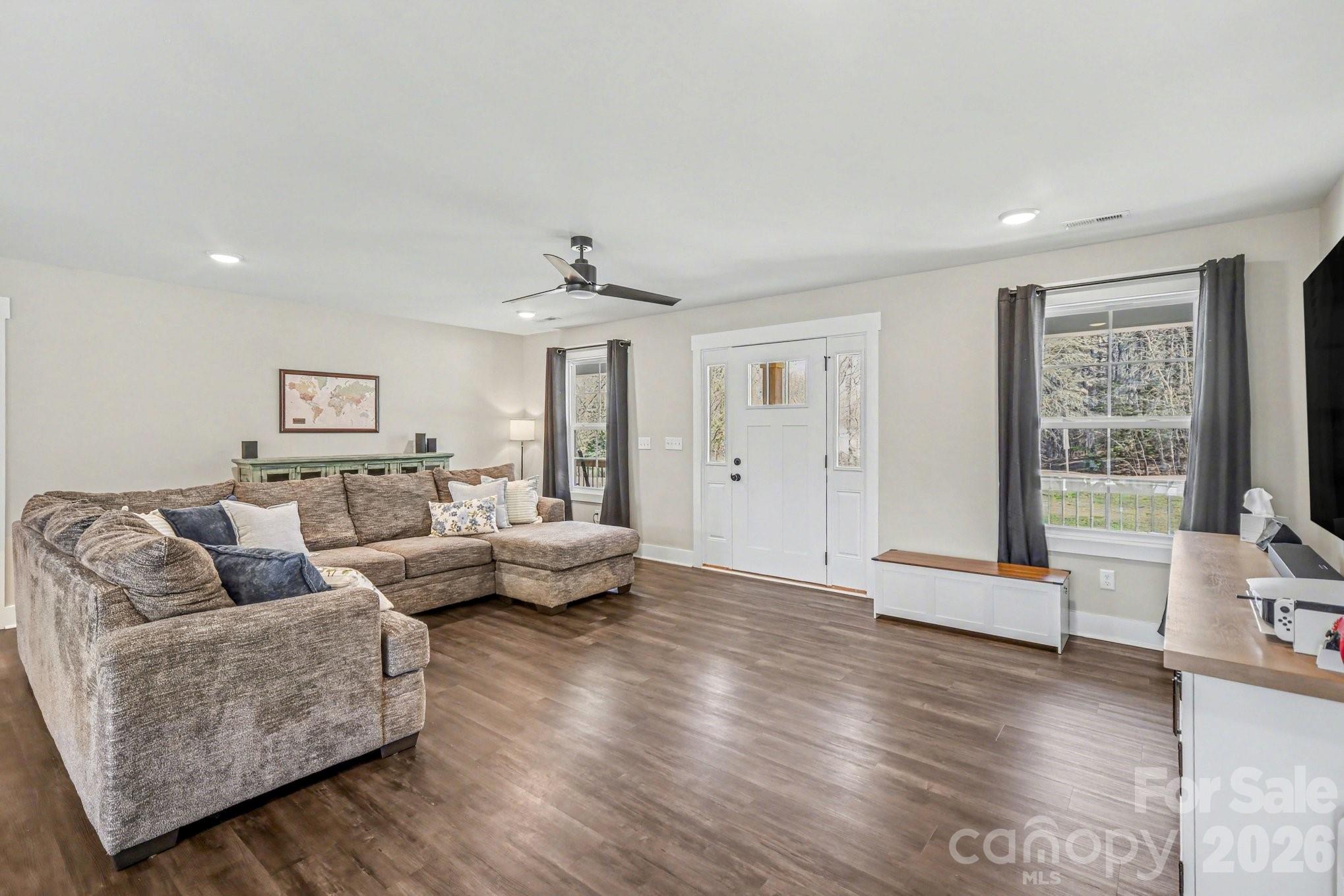 310 Old Hardin Road Dallas, NC 28034 - Photo 8 of 37 a living room with furniture and wooden floor