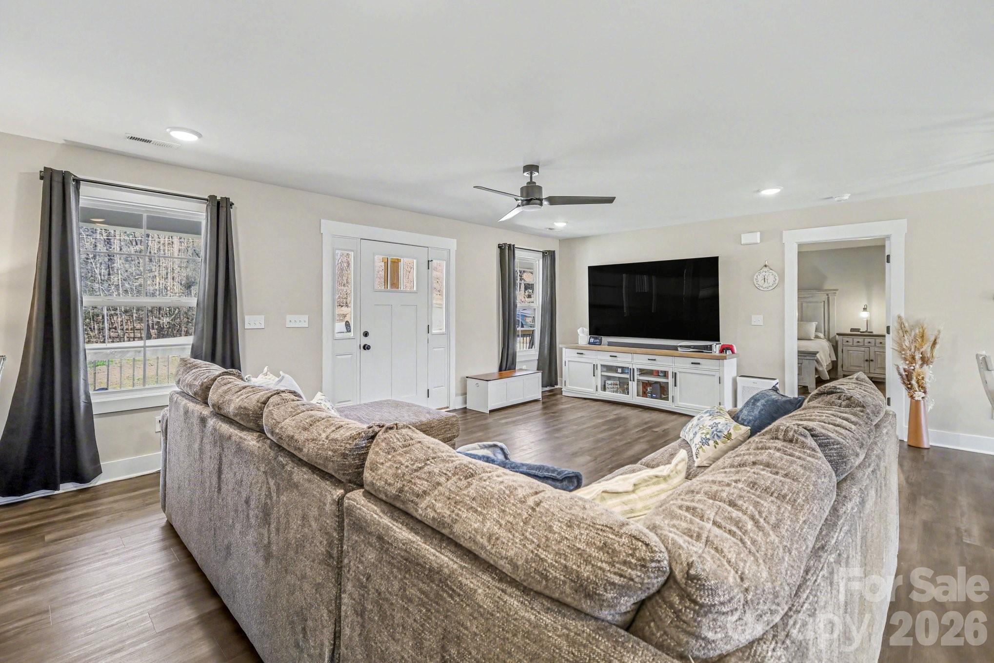 310 Old Hardin Road Dallas, NC 28034 - Photo 9 of 37 a living room with furniture and a flat screen tv