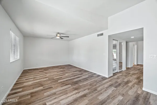 a view of a backyard with sitting area
