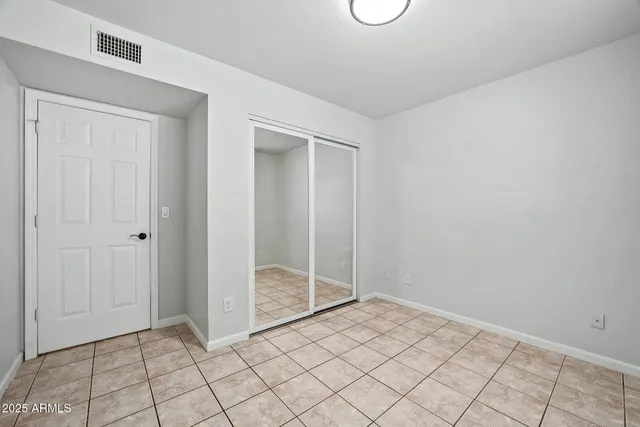 a bathroom with a bathtub and a toilet