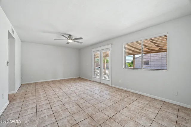 a view of an empty room and window