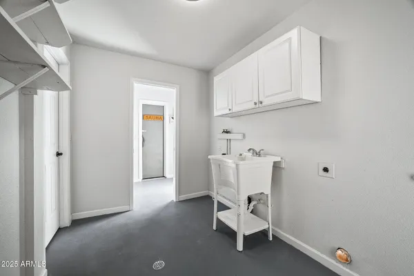 a view of a room with racks on the wall