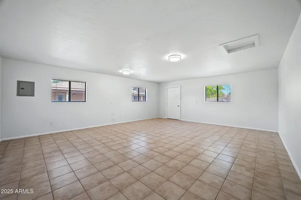 a view of an empty room and window