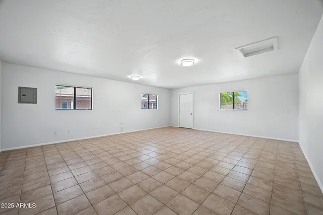 a view of an empty room and window