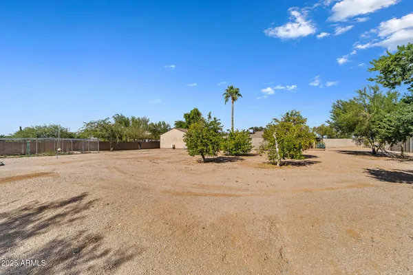 a view of a house with a street