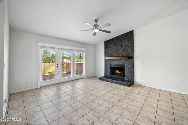 a view of an empty room and window