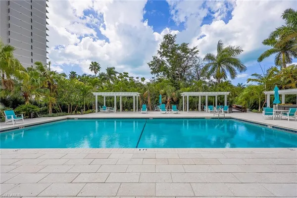 a view of a swimming pool with a patio