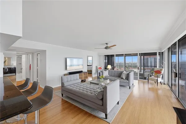 a living room with furniture and a table