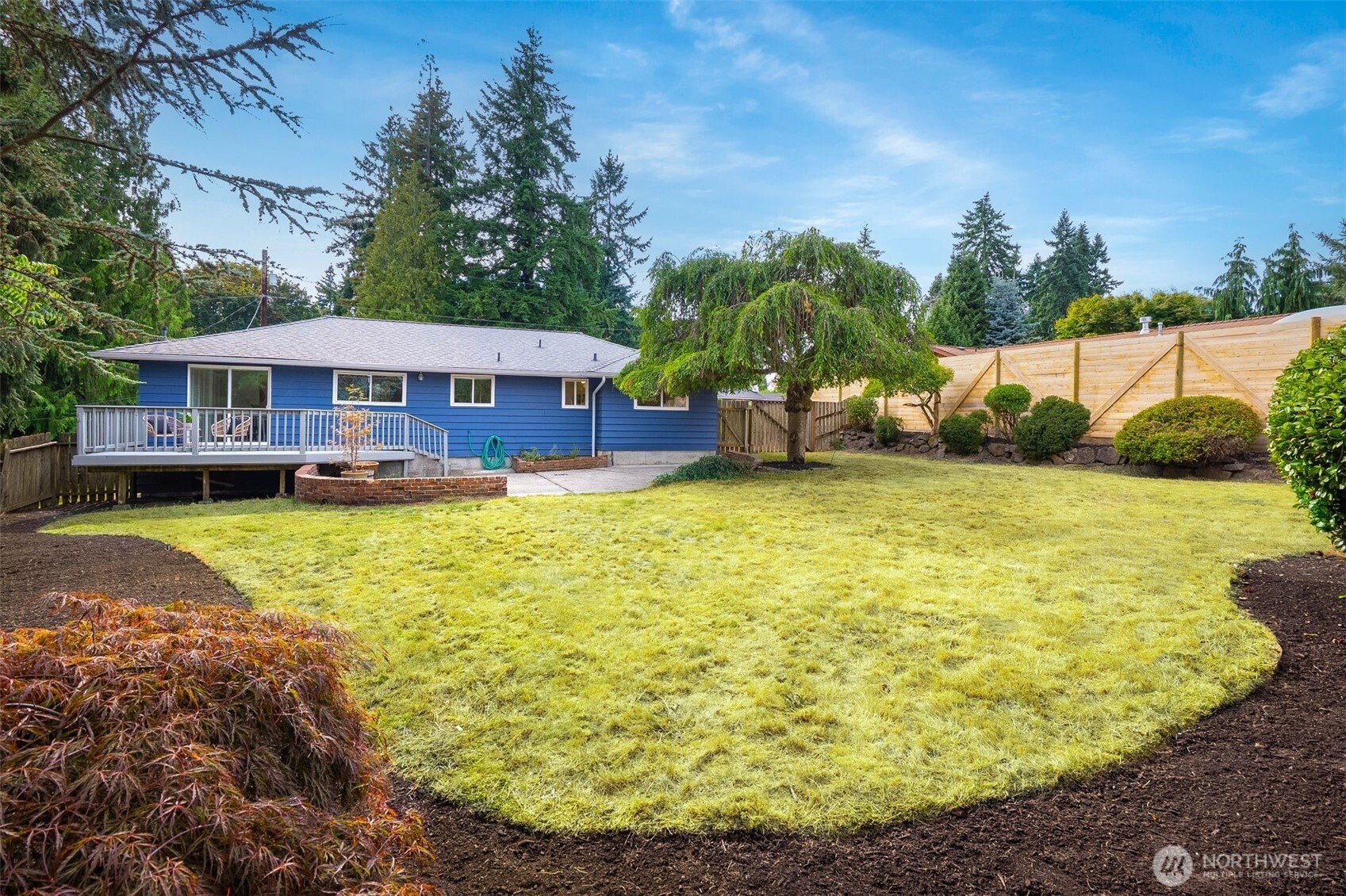 24125 2nd Place West Bothell, WA 98021 - Photo 17 of 29 a view of a house with swimming pool and a yard