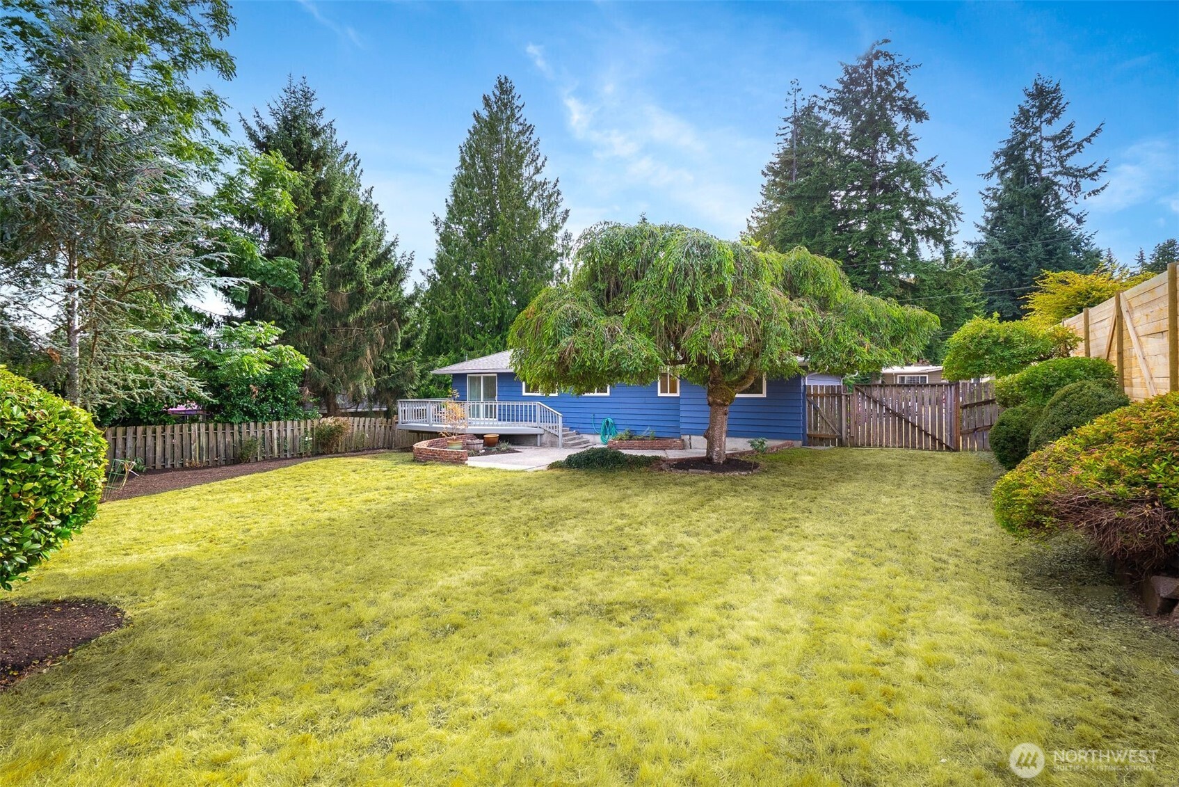 24125 2nd Place West Bothell, WA 98021 - Photo 19 of 29 a swimming pool with yard and outdoor seating