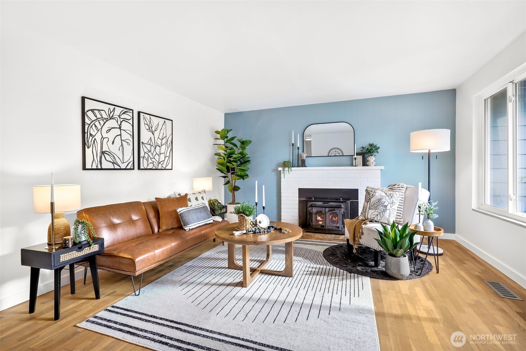 24125 2nd Place West Bothell, WA 98021 - Photo 2 of 29 a living room with furniture and a fireplace
